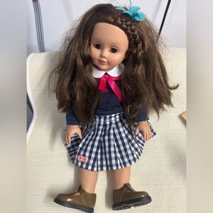 Brunette Doll with Blue Bow and Checkered Skirt